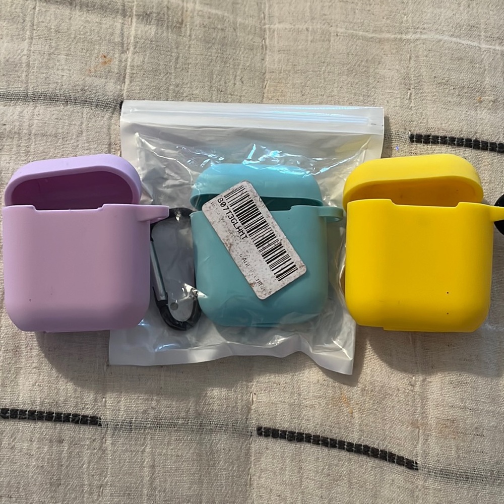 Three AirPod cases purple yellow light blue silicone protective able to charge